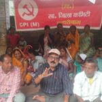 CITU staged a sit in protest demanding the filling of potholes and the commissioning of water towers before Durga Puja