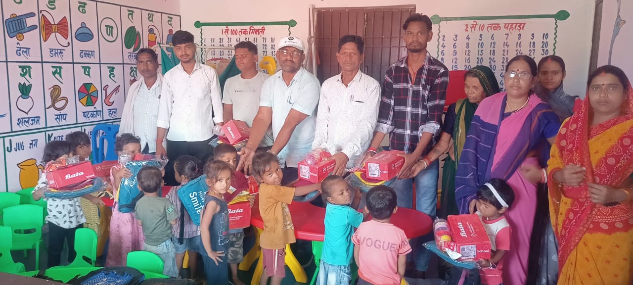 Distribution of clothes and bags among children in Anganwadi centers of Basaria