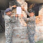 Tandwa police pasted a notice at the house of the absconding accused on murder charges