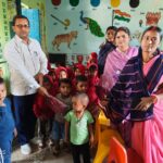 The head distributed sweaters among the children at the Anganwadi Center in Dhanwar