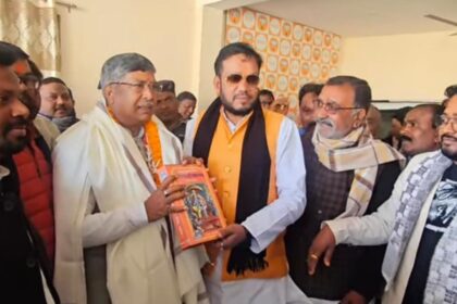 Tony Jain congratulated the newly elected BJP state president Aditya Sahu and presented him with the Shri Ramcharit Manas